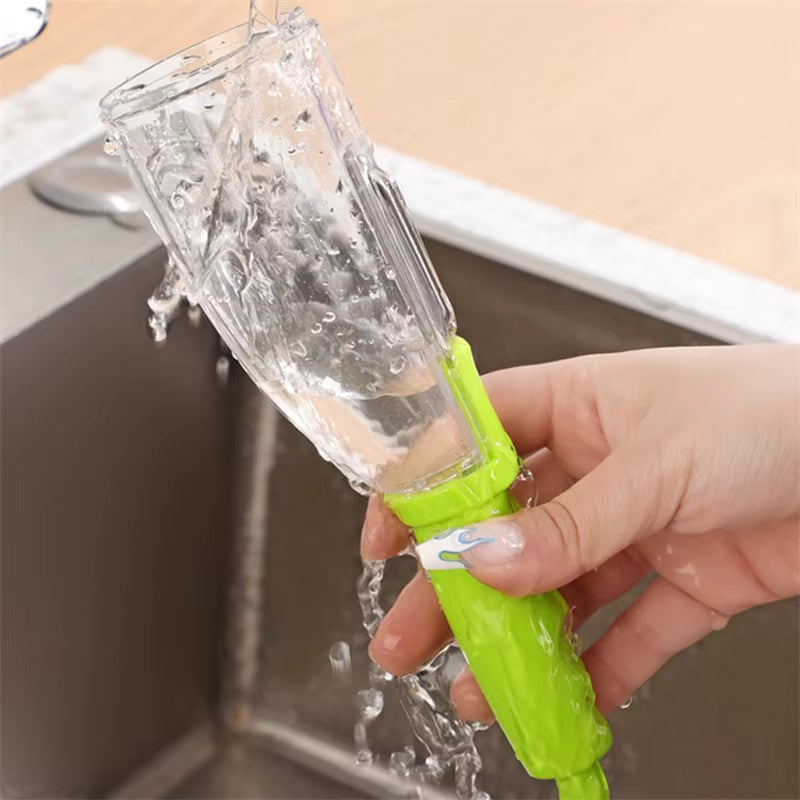 Vegetable Peeler with Container - CozyNest Hub premium handheld tool in green, displayed with fruits on a pink background.
