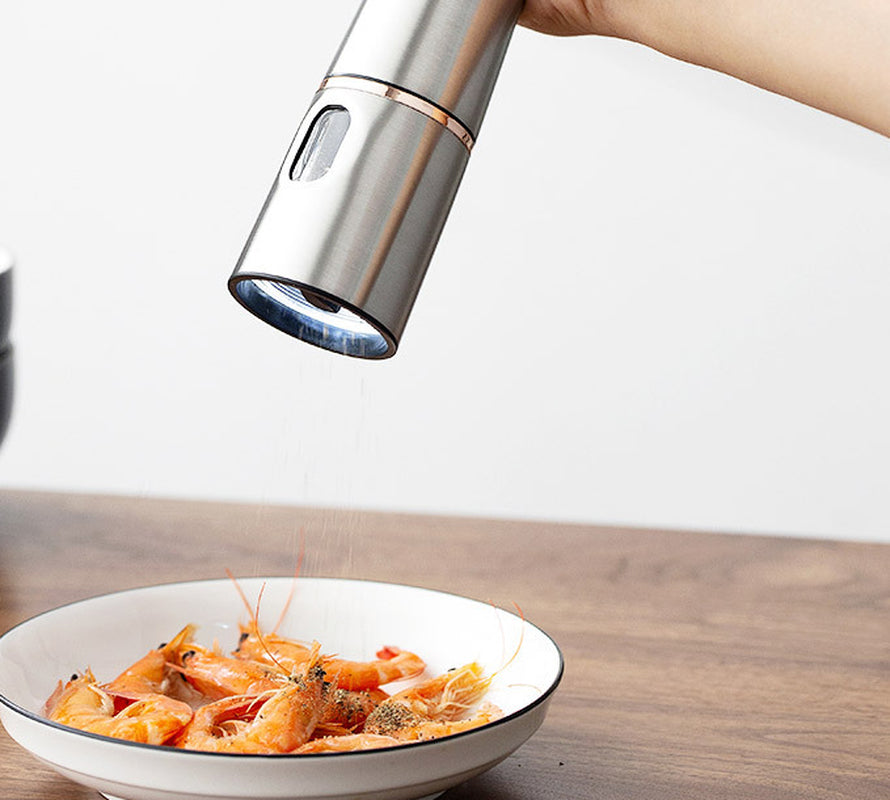 Electric Pepper Mill Grinder - CozyNest Hub Stainless Steel Salt Mill with a sleek design and easy-to-use mechanism.
